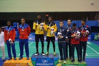 jamaicaolympic's tweet photo. Jamaican MD pair of Samuel Ricketts and Gareth Henry defeat the Cubans again for CAC 2018 Gold in #badminton https://t.co/122wLgLBBy