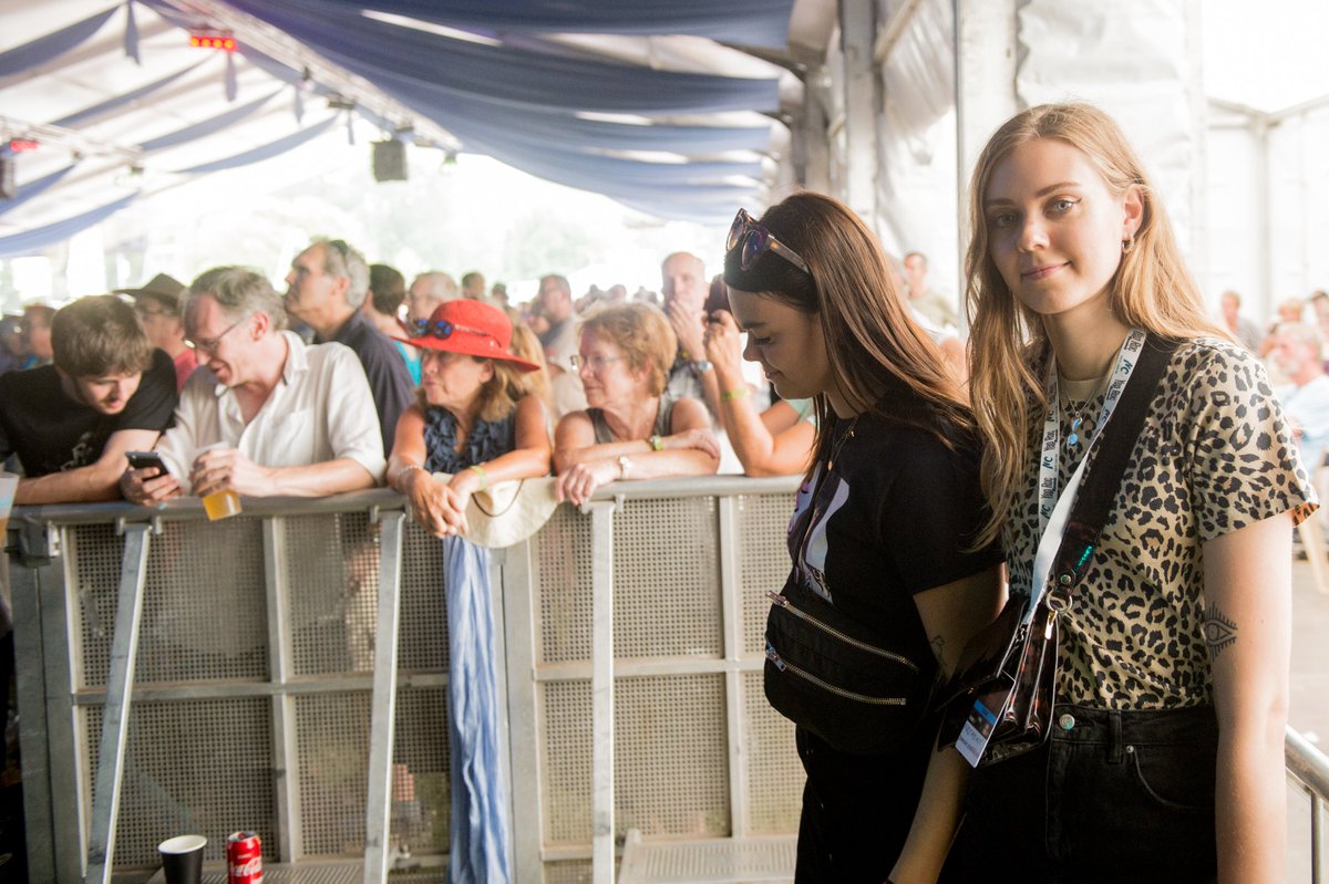 CamFolkFest's tweet photo. Look who we just spotted in the press area! The fab @FirstAidKitBand - who else can't wait to see them perform later today! #FirstAidKit #CambridgeFolkFestival2018 #Cambridge #Folk #Festival https://t.co/x28gOwlNPO