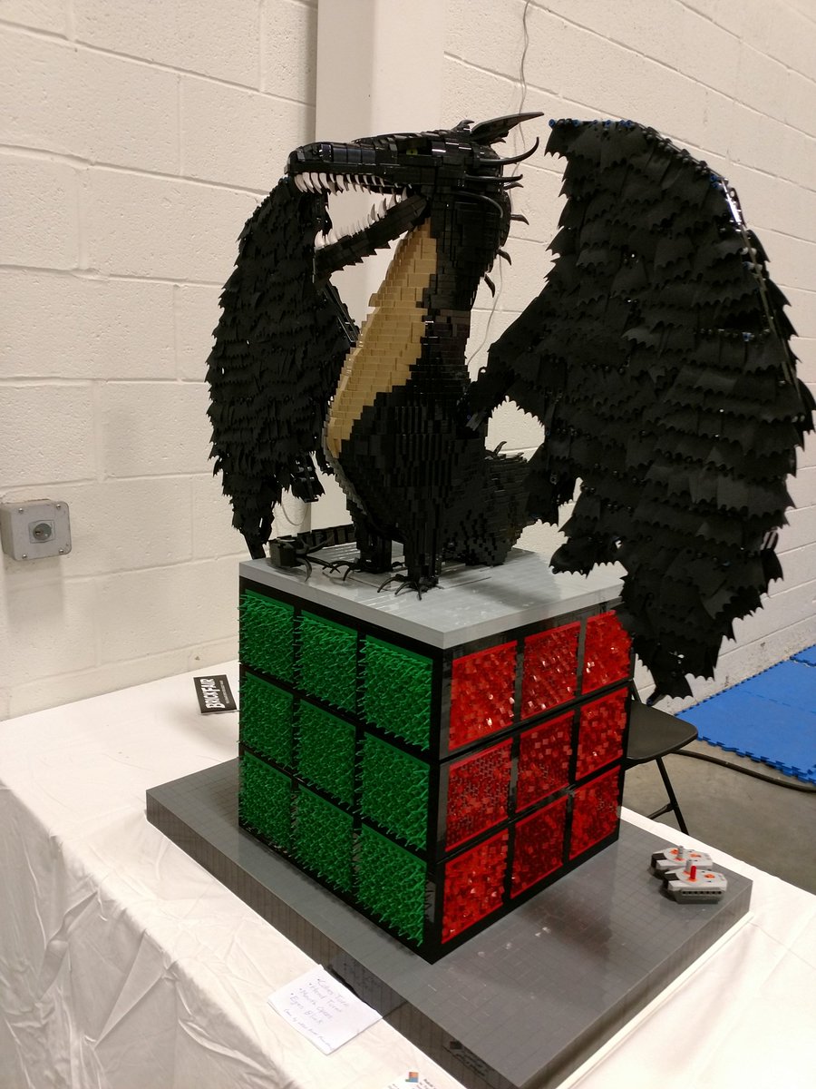 TwoBrix's tweet image. Rubik's Guardian @BrickFair 2018, all made using 100% @LEGO_Group  elements. Eyes blink, mouth opens, head turns, cube rotates