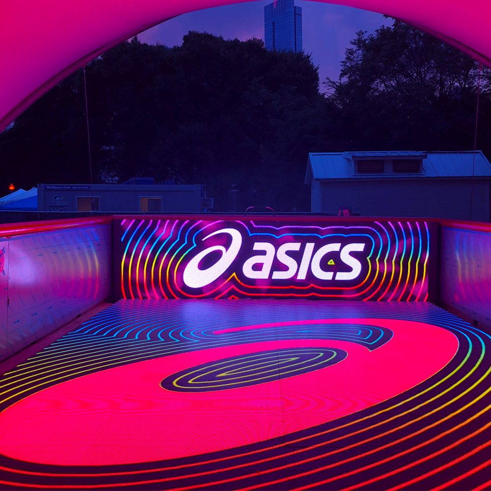 BrightLogic's tweet image. Check out our ActiveFloor™ in action partnered with @ASICSamerica and @justonetfb at @lollapalooza - Happening now! #MOVEWITHASICS