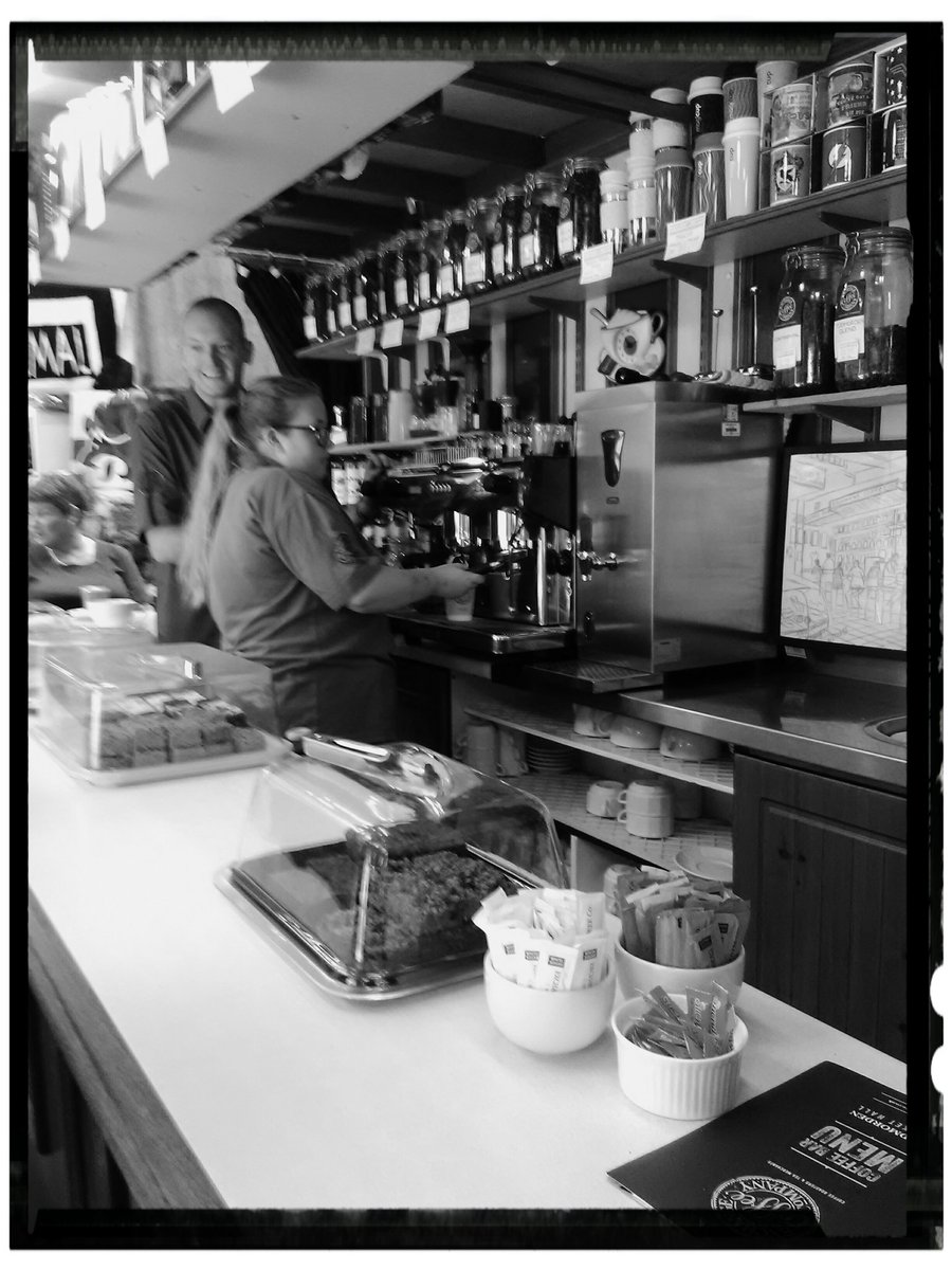 LachlanMain's tweet photo. TODMORDEN. Taking a break at the Exchange Coffee bar in the market hall. #Todmorden #exchangecoffee #blackandwhitephotography https://t.co/SSSRA18RFn