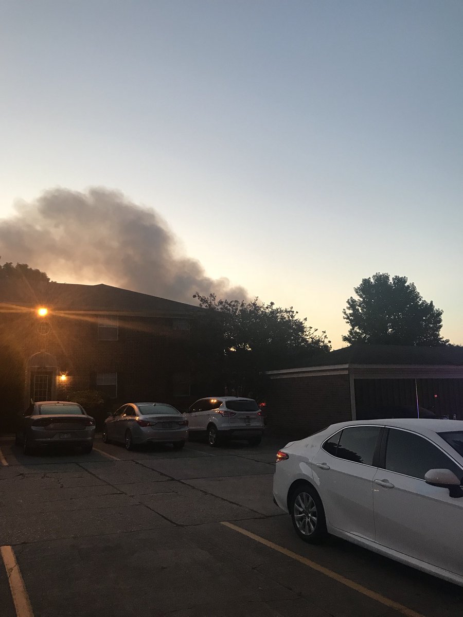 AmberKobb's tweet photo. Heard sirens outside so of course I ran out to see the action. One of the buildings in the apartment complex caught fire around 5:45am. Not sure if anyone was injured. A woman in the building across from mine said her daughter lives in that building https://t.co/r7Rfcu1N7n