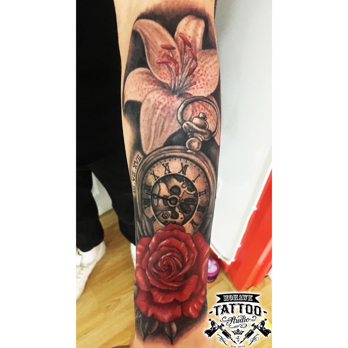 Pocket watch with rose and lily flower tattoo :) Pass by the studio anytime for a free consultation with one of our artists to have a chat about your tattoo ideas and they will put together an amazing tattoo design for you :) 💉💉💉 #glasgowtattoo #paisleytattoo #scotland #ink