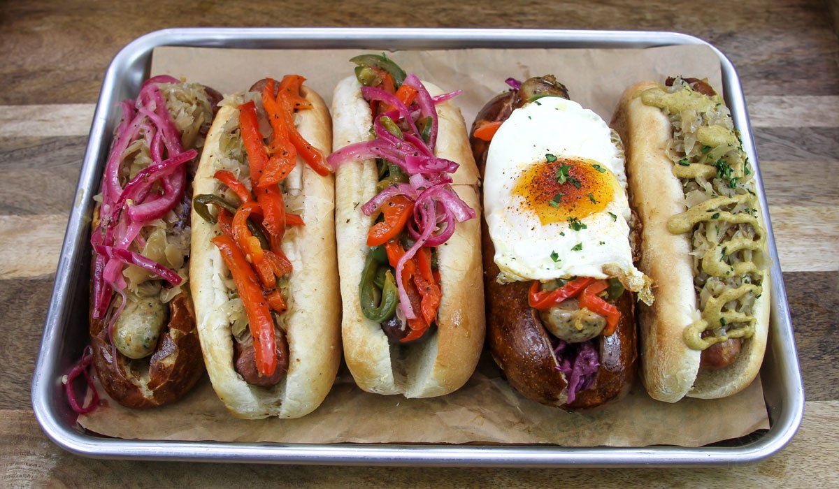 August is all-you-can-eat sausage month at King's BierHaus - The Heights Annual Wurstfest! Choose from a selection of 12+ specialty sausages, which includes traditional, exotic, vegan and plant-based sausages >> kingsbierhaus.com