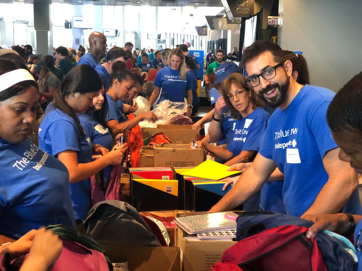 IBX's tweet photo. How do you help 30,000 children get ready to go back to school? @C2CPhiladelphia @PhillySJUnited #IBXBlueCrew + 600 corp. volunteers know the way! Notebooks, pencils, folders and more were packed up + delivered to local students to kick-off the new school year. #BackpackAThon2018 https://t.co/dtm2lNsQAM