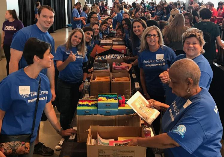 IBX's tweet photo. How do you help 30,000 children get ready to go back to school? @C2CPhiladelphia @PhillySJUnited #IBXBlueCrew + 600 corp. volunteers know the way! Notebooks, pencils, folders and more were packed up + delivered to local students to kick-off the new school year. #BackpackAThon2018 https://t.co/dtm2lNsQAM