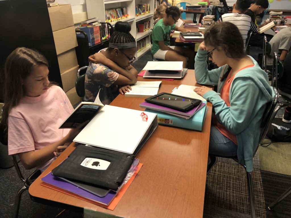 oldhamkc's tweet photo. A class full of readers already asking, “When do we start book clubs?” Thank you 7th grade teachers for encouraging the love of reading! @NGMSgators @NKCSchools https://t.co/pYmA52tspA
