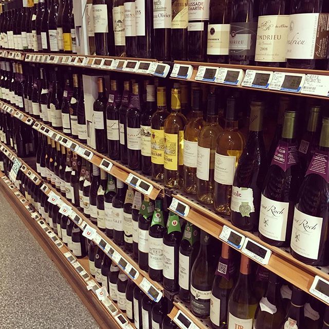 MikeGPhotog's tweet image. One stop shopping large selection of #wine #liquor available in the #french grocery store.  Second time in France but still can’t believe my eyes. ift.tt/2L1abQo