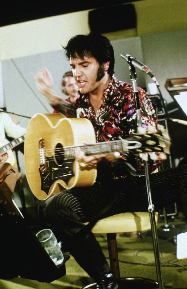Gotta love an action shot! Taken from That’s The Way It Is - a 1970 documentary following Elvis as he embarked on live Las Vegas gigs in August of the same year.

#elvispresley #elvis #theking #kingofrockandroll #thatsthewayitis #lasvegas #action #guitar #hollywood #movie