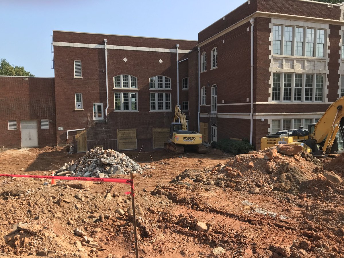 lesliewtaylor1's tweet photo. Whoa! Someone moved the precious green electric box that welcomed all @wileyelementary guests? 👏🏼Despite the mess, don’t you just love the beauty of that building!?! Truly a @WCPSS gem! #1923 #WileyRenoFun (Sidenote: was told to wear boots for my future site visits 🤷🏼♀️) https://t.co/SGET1t30Xm