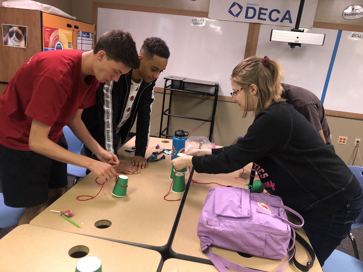 DecaDoherty's tweet photo. Doherty Entrepreneurship students thinking on their feet today creating cup towers using string and rubber bands. Communication, design, and teamwork. Proud of these aspiring entrepreneurs working together to become #emergingleaders #doherty #cte #d11 #coloradodeca #dohertydeca https://t.co/hpHoVHev6O