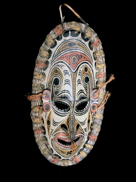 the many tribes living along the Sepik River, particularly the middle of it, are famous for their elaborate masks. You may have seen them before, hanging on the walls of someone who mistakenly thought an "exotic tribal mask" would complete his apartment's decor.