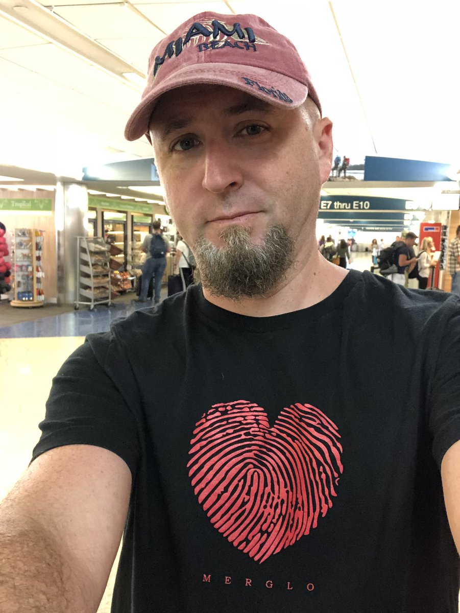 Merglo's tweet image. Traveling through the airport in #FortLauderdale wearing my favorite Merglo Shirt!! #luxury #Swag