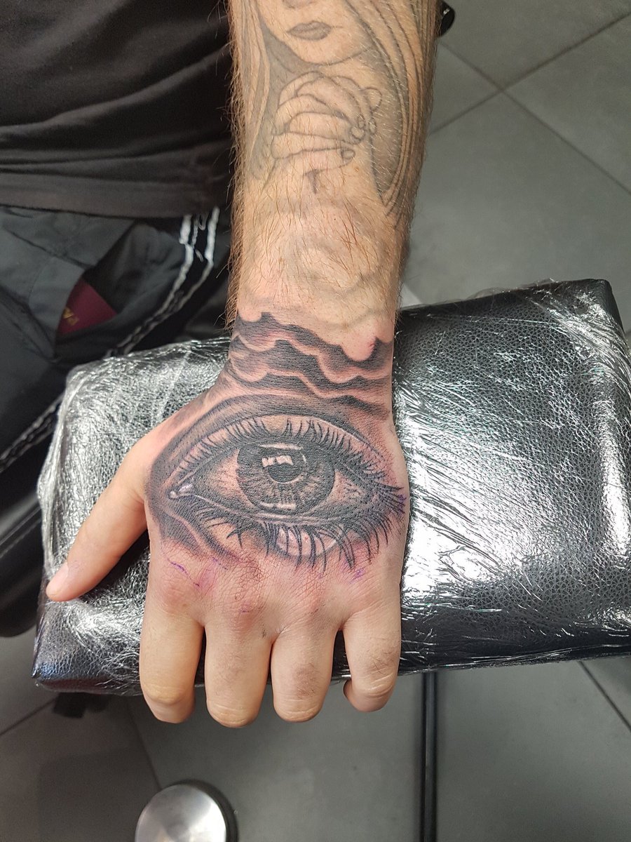 Eye Hand Tattoo by Jeremiah Barba TattooNOW