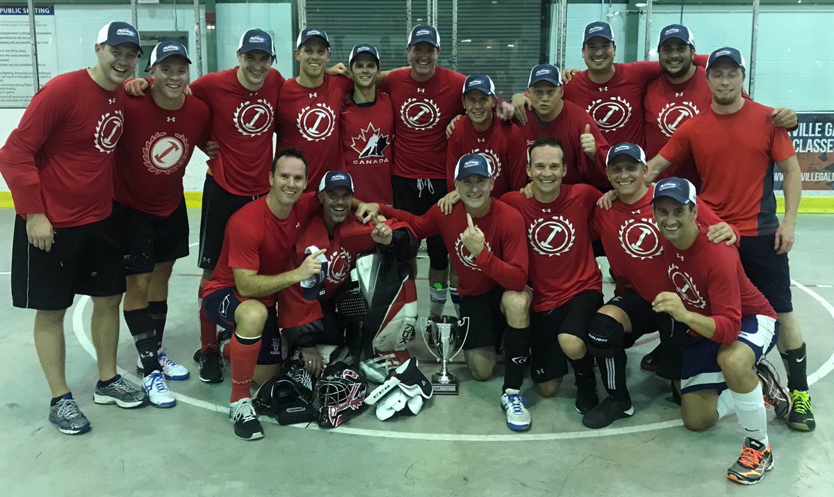 BiztheWiz's tweet photo. Team pic finally arrived in my inbox. Game 1 Loss we had 6 Forwards and 3 Defensemen. Game 2 - all cancelled their vacations, dinners and showed up when it mattered #champs #teameffort #greatguys https://t.co/y8qWkTDryj
