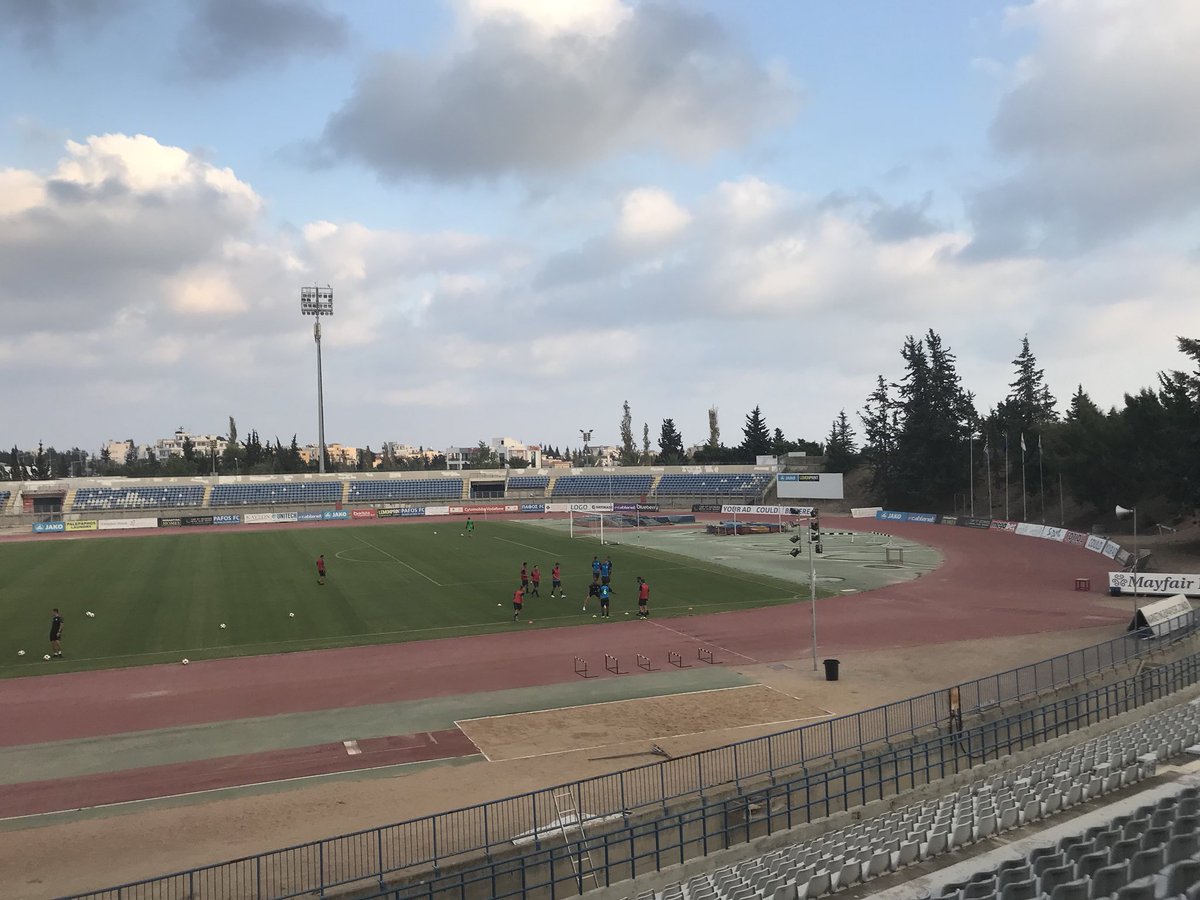 ArRobbo71's tweet photo. Paphos fc v fuck knows 
Stephen Presley’s the manager,I’d shout “fucking traitor” towards him but I’m fucking miles away!!
Better stadia than dens though.
#paphosfc #shantytown #soweto 
#out https://t.co/xBuksIz7o1