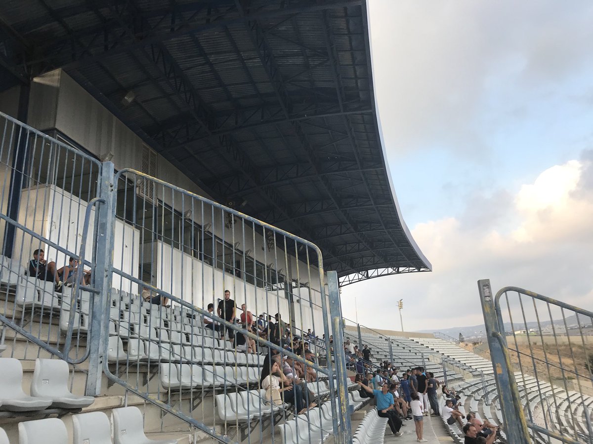 ArRobbo71's tweet photo. Paphos fc v fuck knows 
Stephen Presley’s the manager,I’d shout “fucking traitor” towards him but I’m fucking miles away!!
Better stadia than dens though.
#paphosfc #shantytown #soweto 
#out https://t.co/xBuksIz7o1