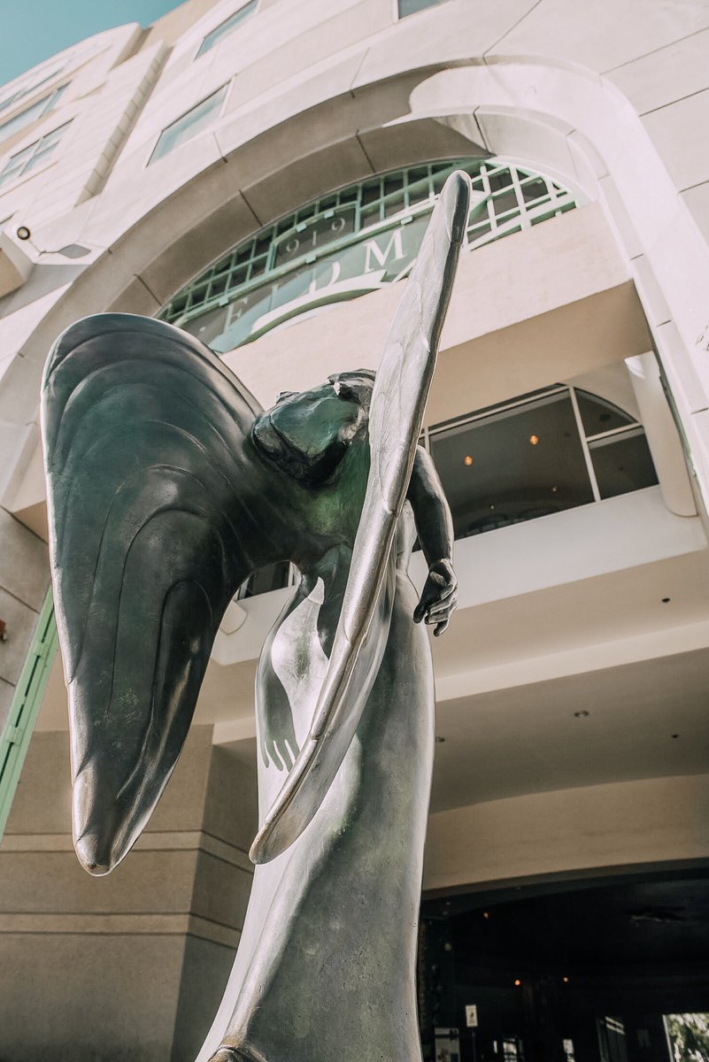 FIDM's tweet image. Ever wondered what the masked angel statue on the #FIDMLA Campus means? The piece was created in 1990 and is titled &quot;Transforming Yourself Into Fashion.&quot; It depicts that in LA, many people try to change their image, masked in mystery. #FIDMFact