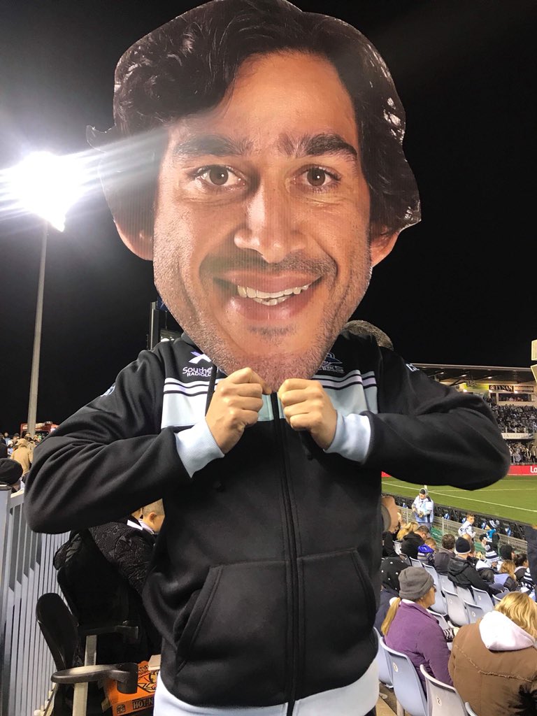 TheCSSC's tweet photo. Our small tribute to a legend of the game. As many @Cronulla_Sharks fans as possible over 3 bays wearing the iconic headgear of JT. Thanks to the @nthqldcowboys for helping to make this happen. #CSSC18 #JT #FutureImmortal #NRL #UpUpCronulla #RideEmCowboys https://t.co/pvqQgAfhHP