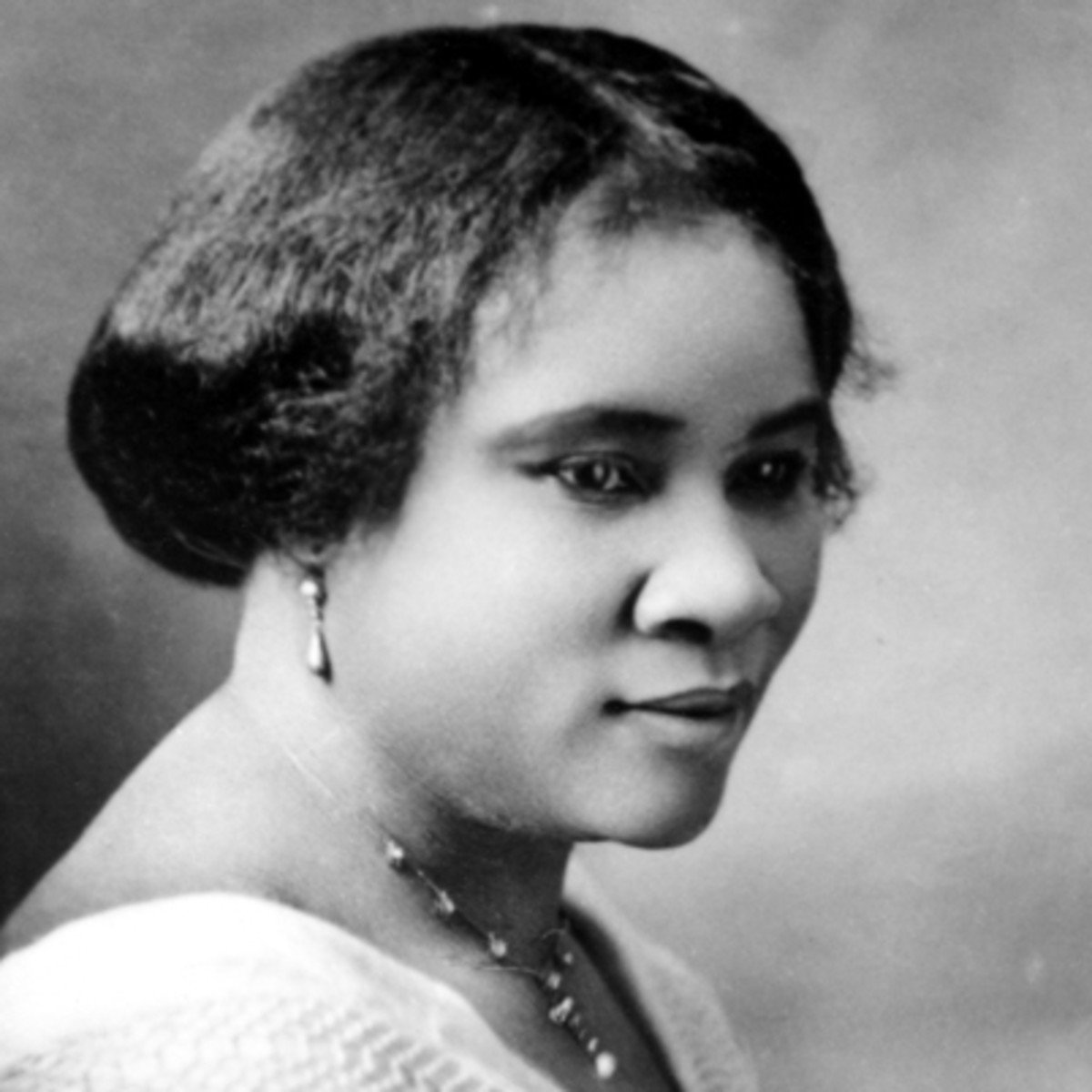 (No black hair thread would be complete without mentioning Madam CJ Walker, the first self-made woman millionaire in America... who made her fortune selling hair-straightening solutions. Black hair care continues to be a lucrative business.)
