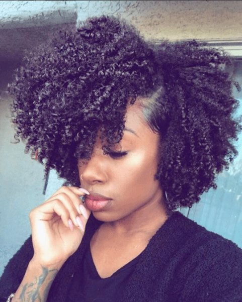 The twist-out slightly resembles another style, one that's the holy grail for a lot of kinky-haired people.The WASH-N-GO. Or, as I like to call it, "TV commercial hair."