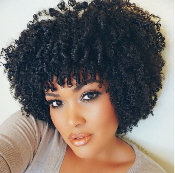 The twist-out slightly resembles another style, one that's the holy grail for a lot of kinky-haired people.The WASH-N-GO. Or, as I like to call it, "TV commercial hair."