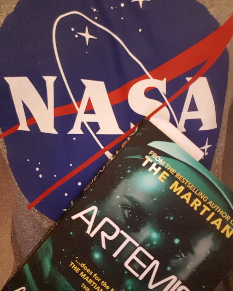 Ashley_james74's tweet photo. Just noticed the t-shirt that I'm wearing whilst reading my newest book. Subconscious? #artemis @andyweirauthor @NASA #virtualbookclub https://t.co/Ek3HYzuiSX