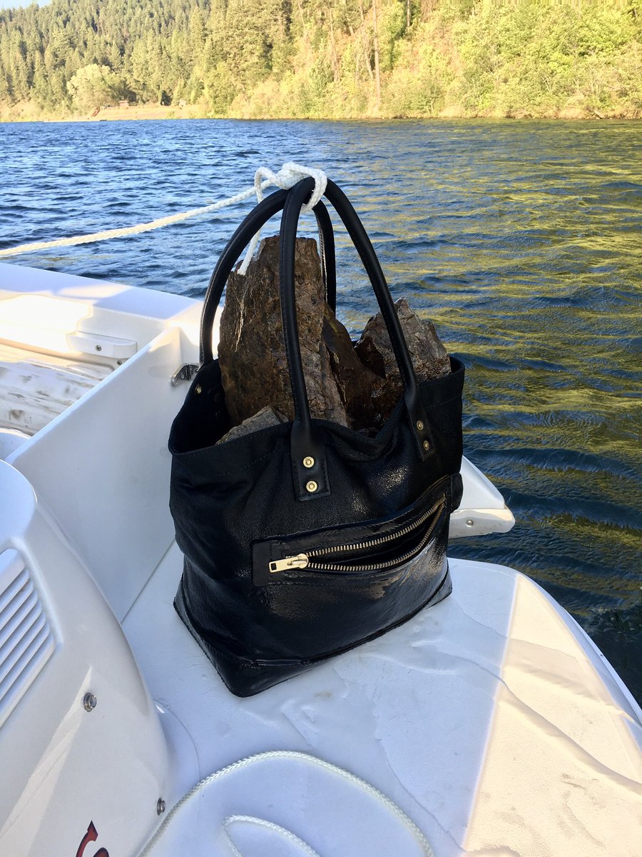 thruxlawrence's tweet photo. The happiest Thrux bag there ever was. Forgot to load the anchor on the boat, so we made do with a hoist tote full of rocks. https://t.co/IFCSePCt3p