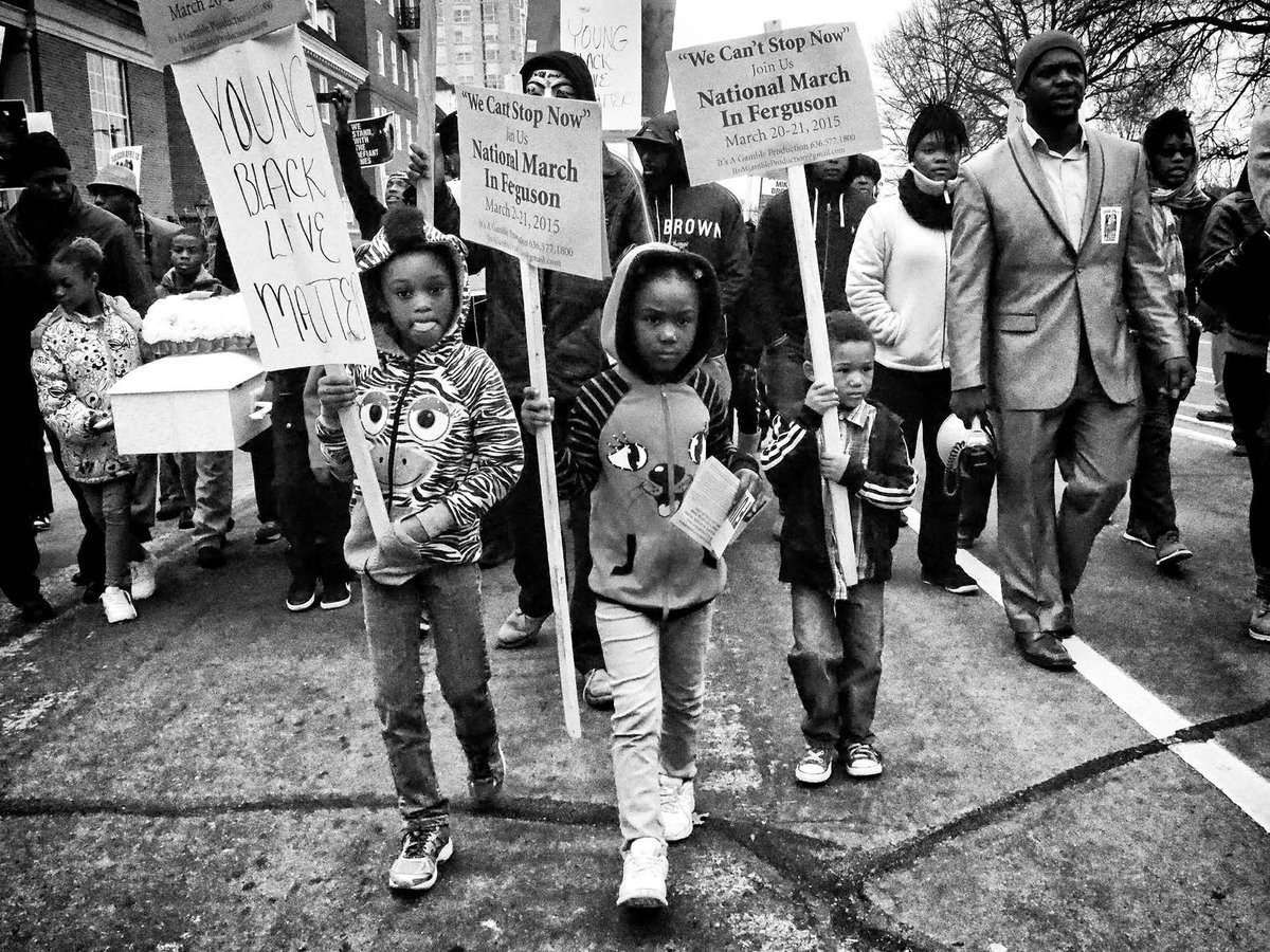 womensart1's tweet photo. Ferguson protest, March, 2015, by photographer and activist Sheila Pree Bright #womensart https://t.co/zzrvh9IIkF