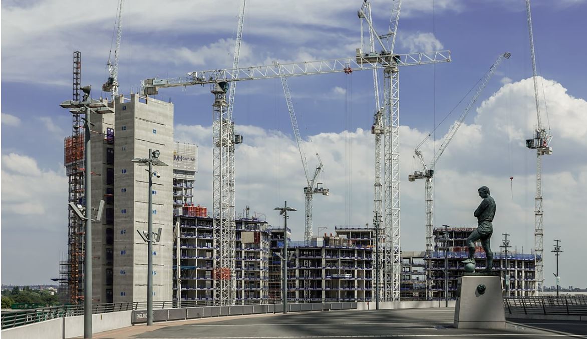 QuintainLtd's tweet photo. The scale of construction at #WembleyPark is best represented by plot E03, where we are spending £45,102 an hour on Canada Gardens for @TipiLondon, delivered by @SiskGroup under the watchful eye of Bobby Moore's statue at the iconic #WembleyStadium https://t.co/vIQsMxsVRU