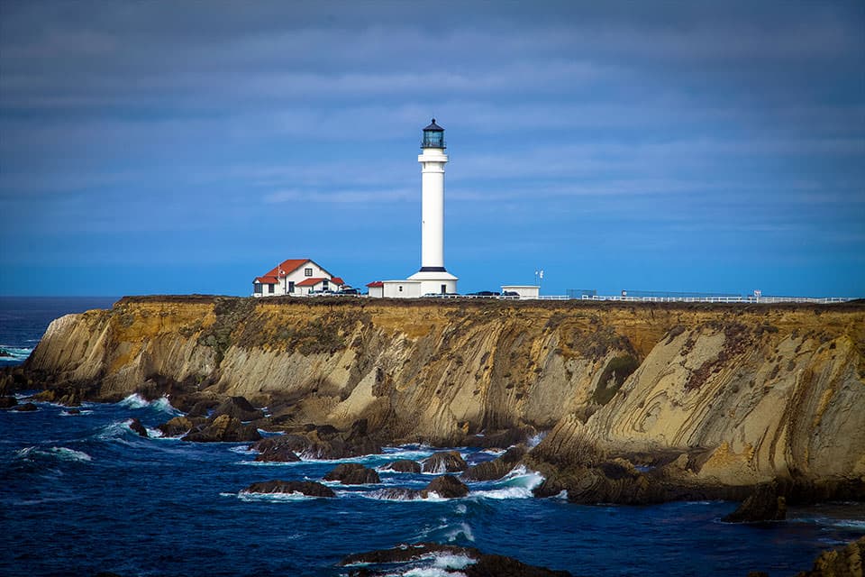 An image of a lighthouse on the coast