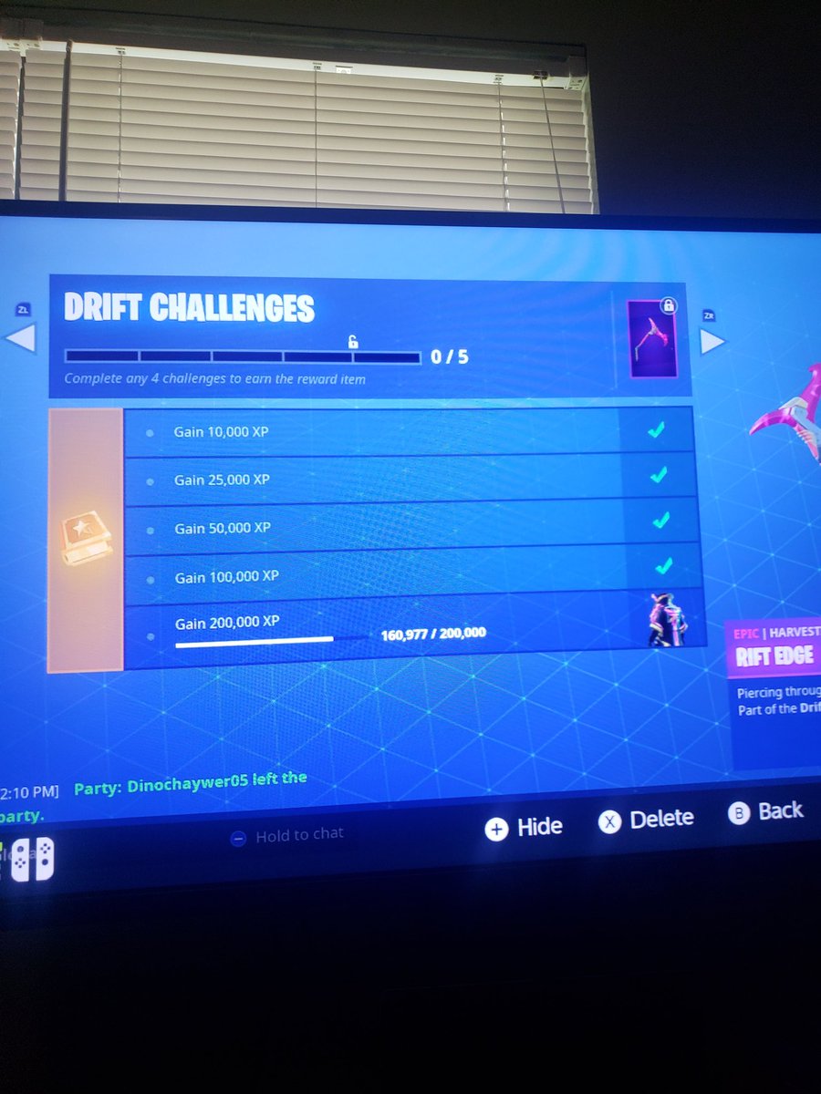 Batfan2015's tweet photo. @FortniteGame After the new patch this morning on the Switch, I am not receiving the week 4 road trip prize for completing the week. https://t.co/CAXyXCaz0v