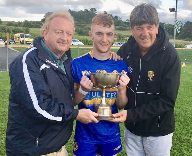 EastDownGAA's tweet photo. Well done to @SaulGac_AnDun who won the @mccartansports East Down Minor A League.
Paul McCartan and Ger Connery presented the League Trophy to Saul captain Niall Laverty.
Very well done to the St Patrick’s Club and many thanks to our sponsor McCartan Sports.
#EDML 🔴⚫️ https://t.co/LSTQt8tuaP