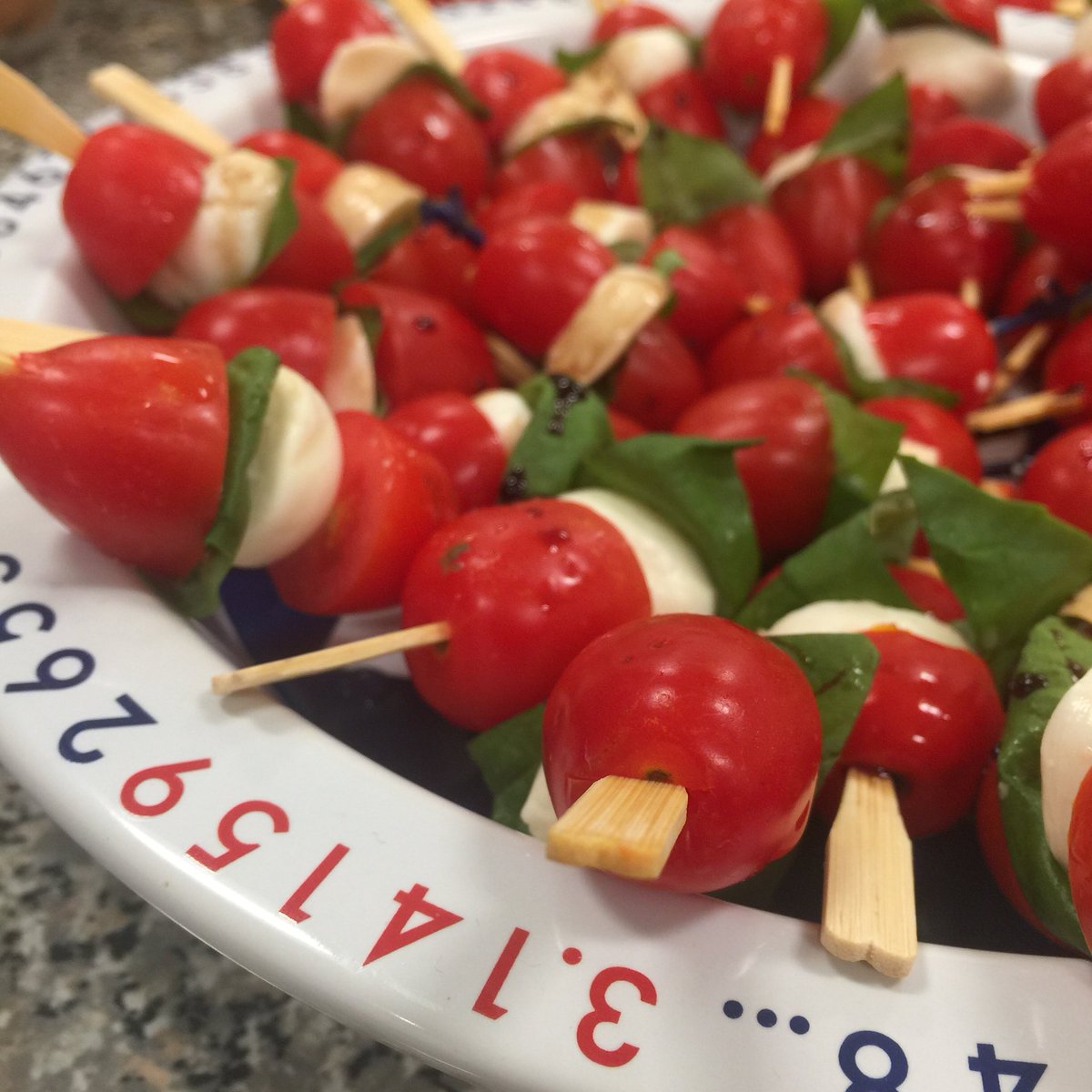 EricSWalls's tweet image. Jan’s Capri Skewers on her “Pi plate” @AkronMath  #gamenight