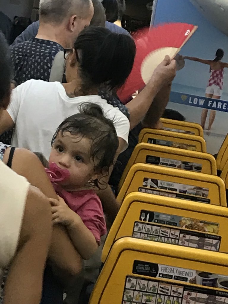 allisunraymond's tweet photo. @Ryanair delayed us for 4 hours, let us on a plane with no air conditioning to wait to take off and would not let us off the airplane for 45 minutes with no flowing oxygen in 95 degrees? Look at the babies on this flight! #Ryanair #childabuse https://t.co/ykAVrO8BrJ