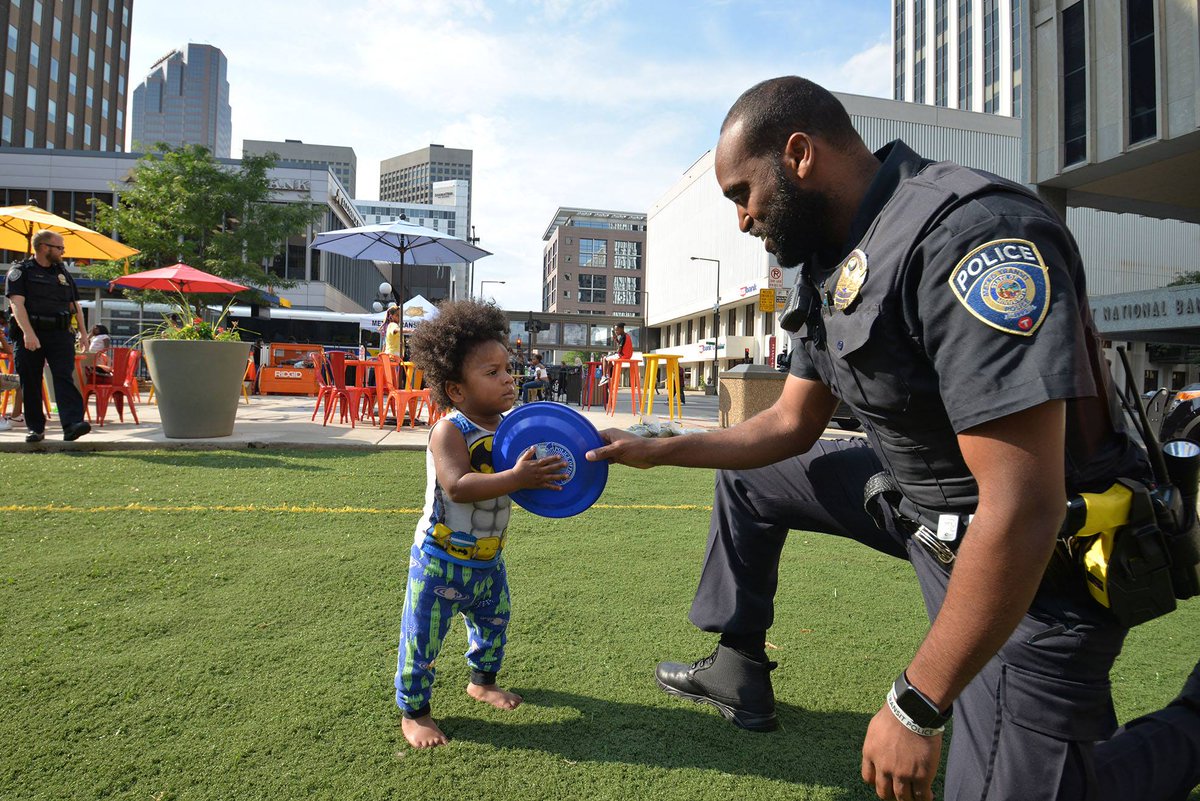 Metro Transit Police Officers visit with the community at National Night Out