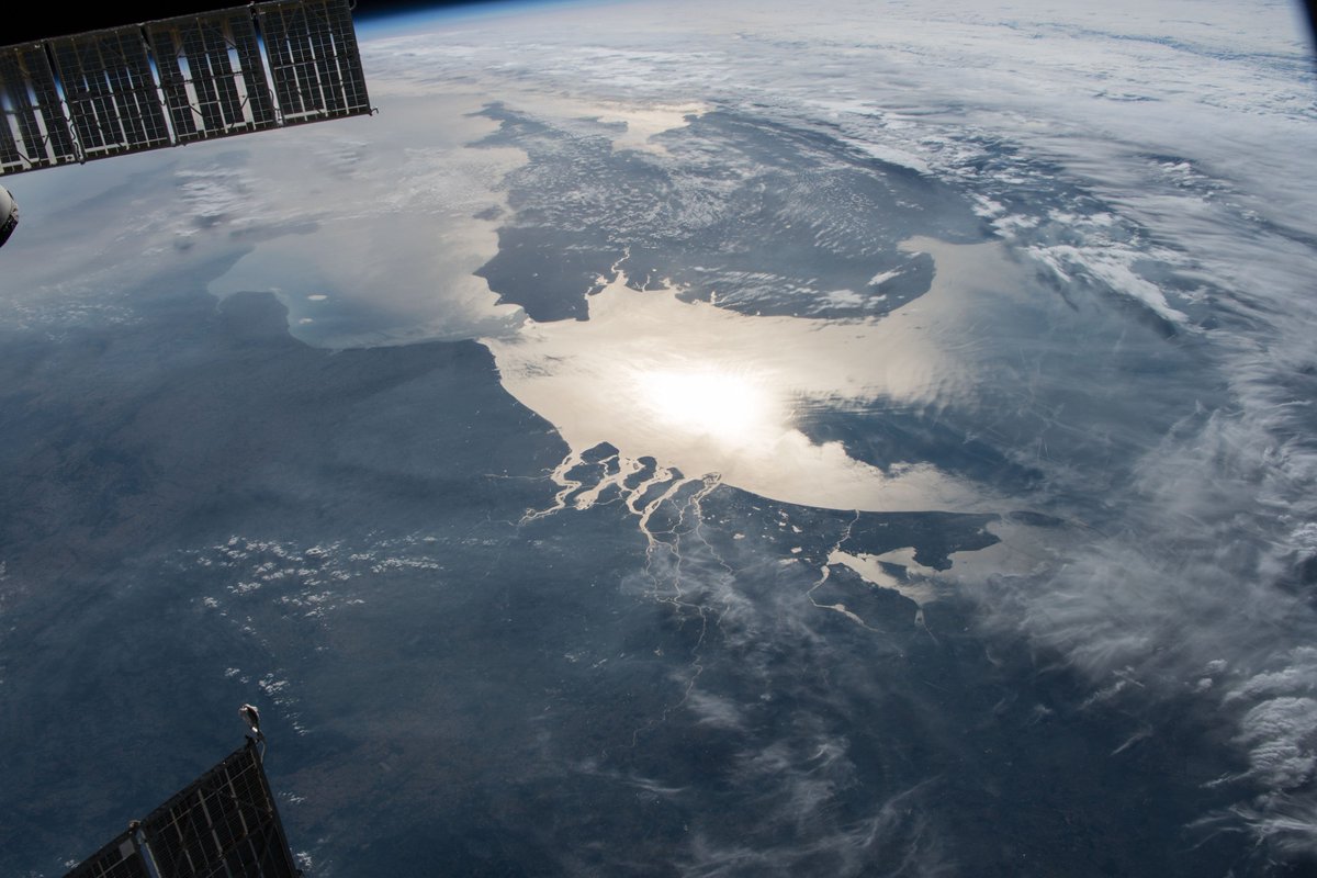 The Sun's glint lights up the waters from around the globe as the station orbited across North America, Hawaii, Africa and Europe.

1. The North Atlantic Ocean
2. The Hawaiian Ridge
3. Northern Botswana
4. The English Channel and North Sea