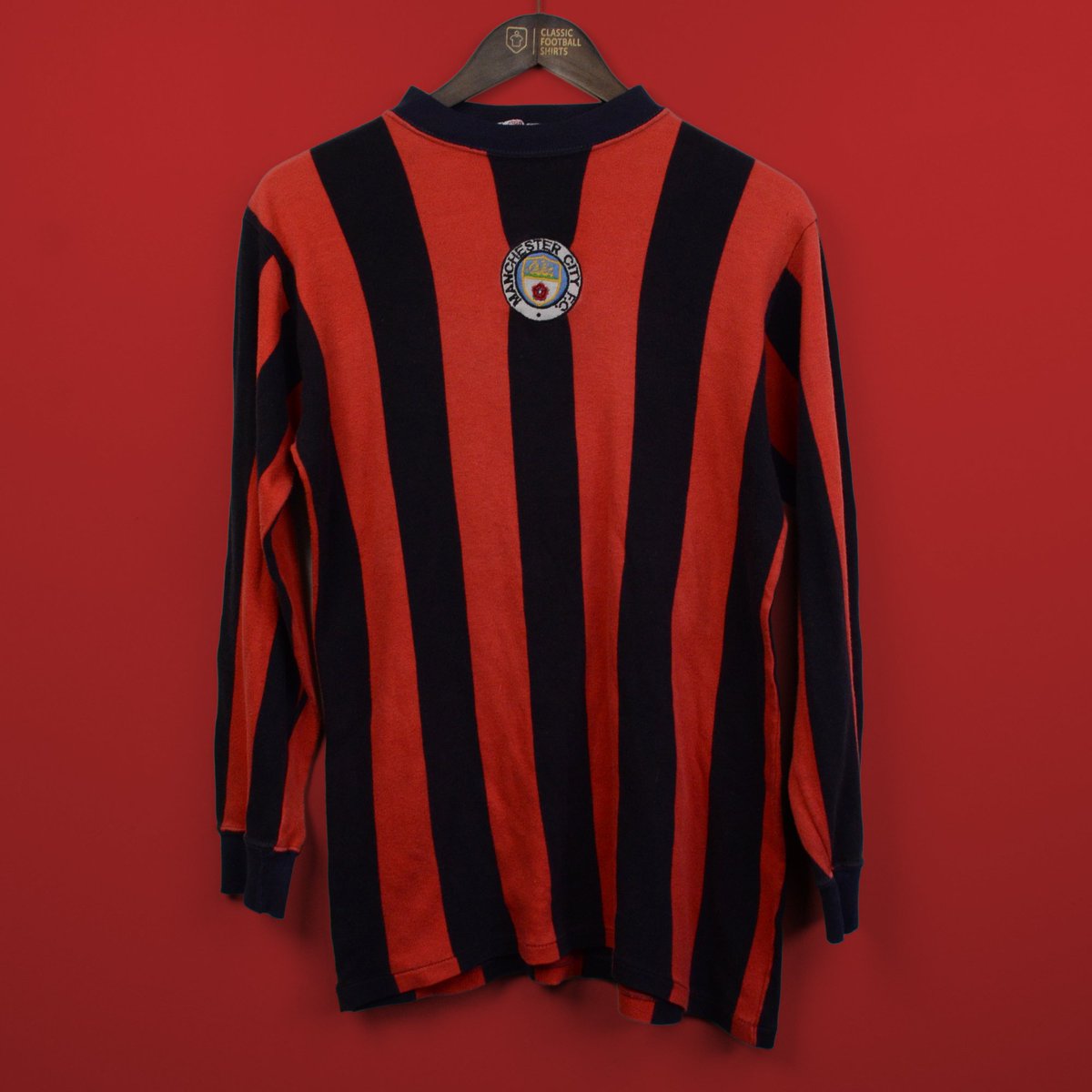 man city red and black kit