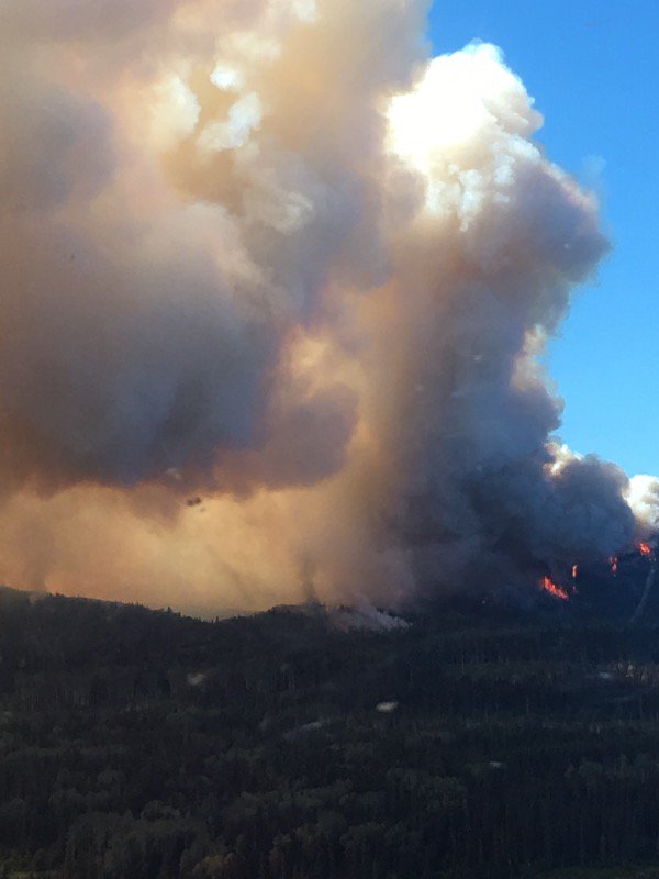 DNVFRS's tweet photo. DNVFRS's Structural Protection Crew working hard to protect structures threatened by the Wildfire currently  burning on the west shore of Babine lake near Smithers, BC. #BCwildfires #fireprotection #firesafety #DNVFRS https://t.co/CdPixOcMdz