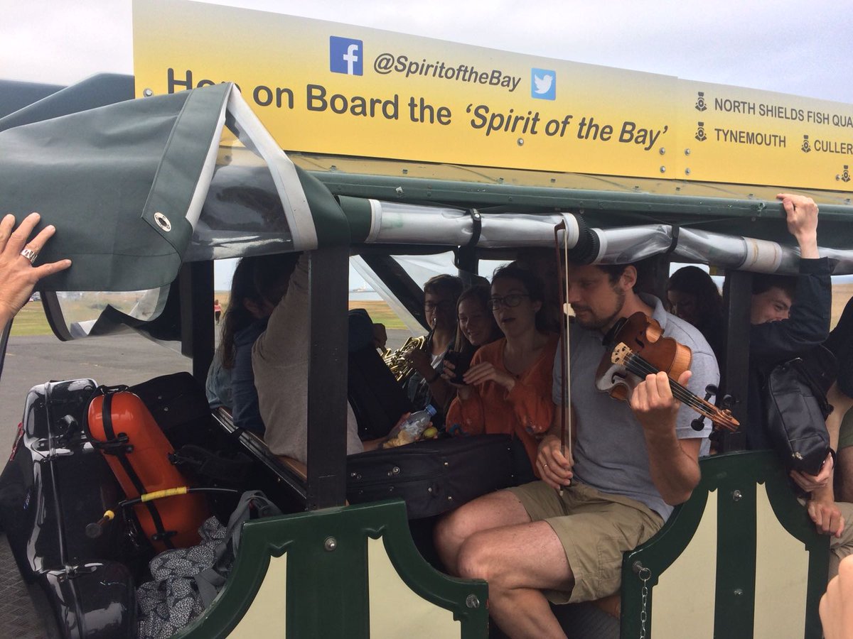 StreetOrch's tweet photo. We fitted in this tiny land train in Tynemouth...just about! @spiritoftheBay #throwback https://t.co/M3pmKEyh8u