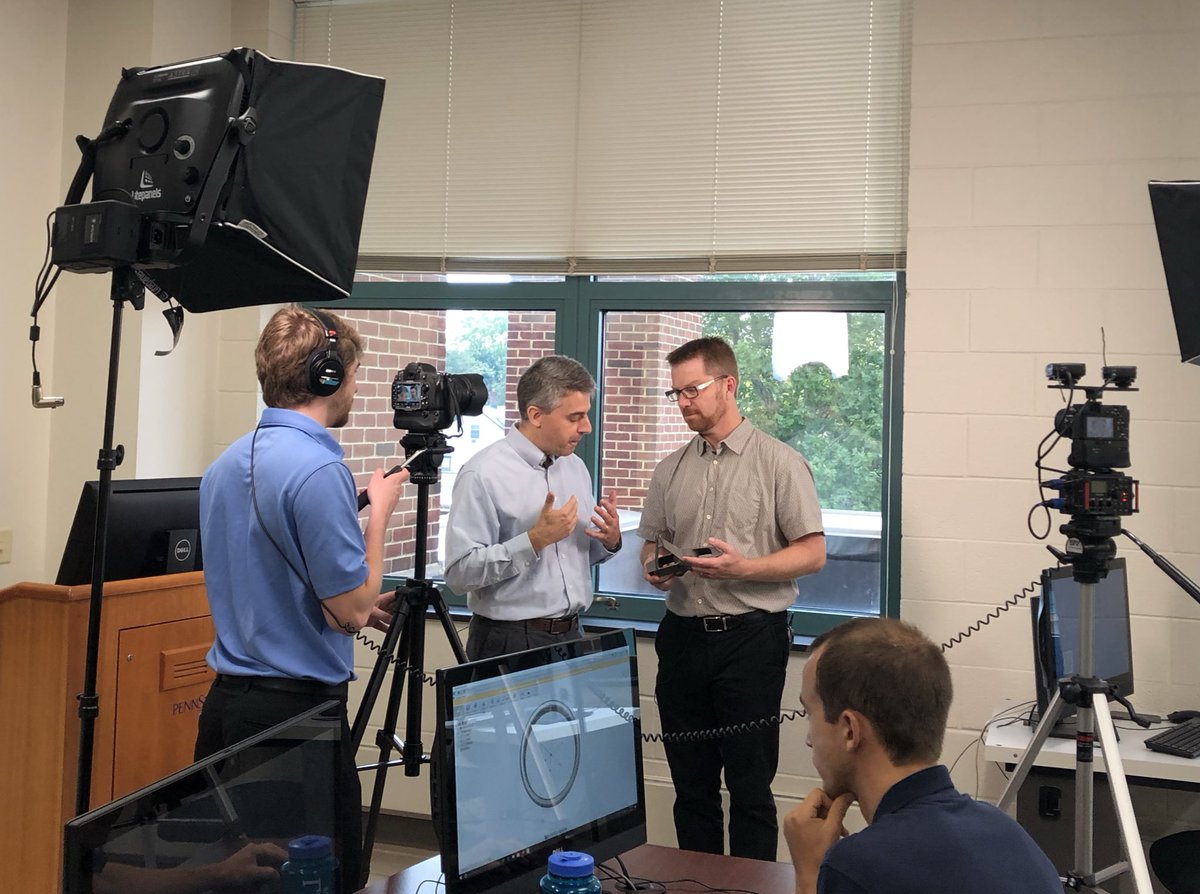 AddMfgMedia's tweet photo. AM editors are filming video onsite today at Penn State, home of one of the nation’s first masters degree programs in #additivemanufacturing. Up first, @Z_Axis_MMS interviews @PSUMakerProf about AM issues including tessalation &amp; support structures #behindthescenes https://t.co/PaYbF0Q3oh