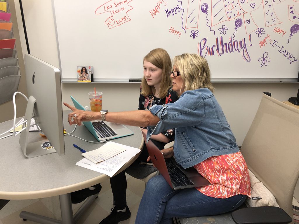 EssexNorthShore's tweet photo. Intern Kat and Ms. Rodolico working on the schedule! They should be ready soon! #SummerAtENS #ENSTechnology #HawkTalk https://t.co/wvv9cdJTut
