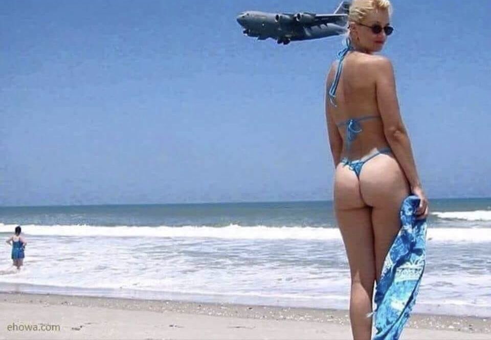 WayneElcock's tweet image. We’re on holiday and mrs said take a picture 📸 of me on the beach when next plane comes over , no problem babe......Thats her on the far left.......