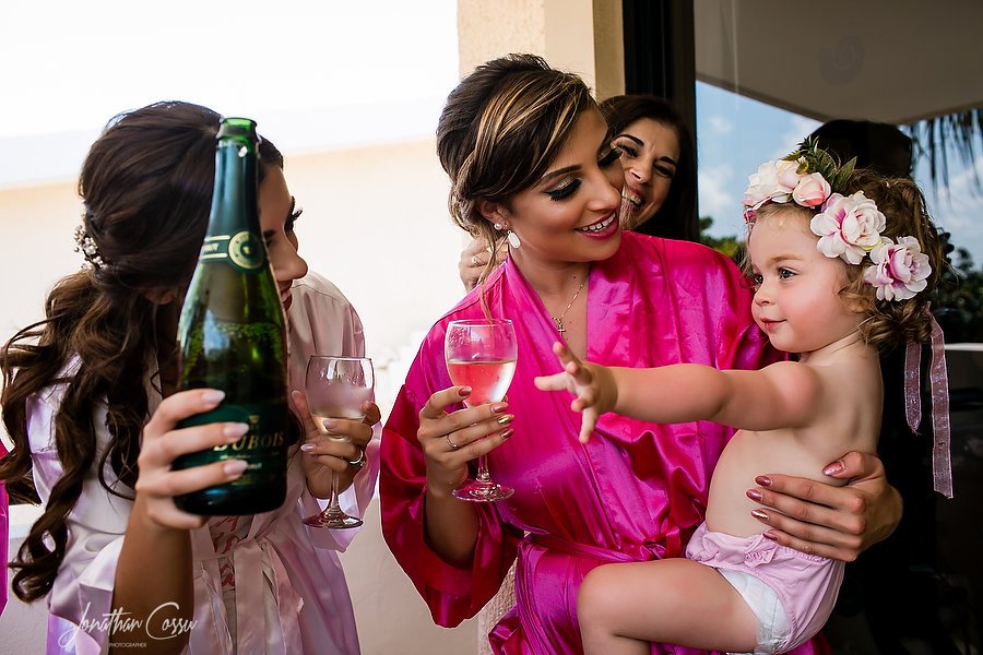 Someone's thirsty, lol. Cheers to more fun love stories. #JonathanCossu #kidsatweddings #realweddings #destinationwedding #NowSapphire #weddingphotography #RivieraMaya