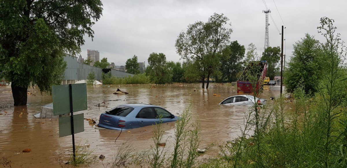 Flash floods cause bridges to collapse, mud rivers to flow, hundreds to ...