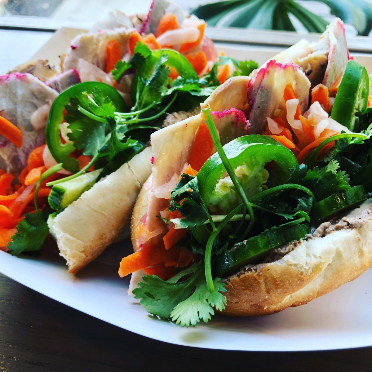 “Best Bánh Mì I’ve had in the Midwest!!” - yelp review.  Homemade pate, 3 different types of grilled pork, sriracha mayo on a 10 inch bun.  #61pho