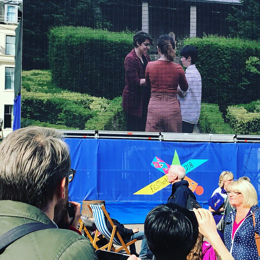 GlasgowGoMA's tweet photo. @LeicsMusStud interns on the big screen in George Sq as part of Monster Chetwynd’s #FaceCream commissioned for #Festival2018 #notyouraverageinternship #museumstudies https://t.co/2P4kv5IzlA