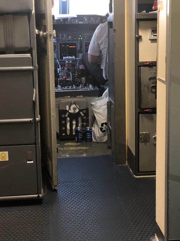 Braym0's tweet photo. At first glance I thought these were bud light cans in the cockpit... it’s canned water @SouthwestAir #notbeer #H2Otogo https://t.co/WaNeUttpB3