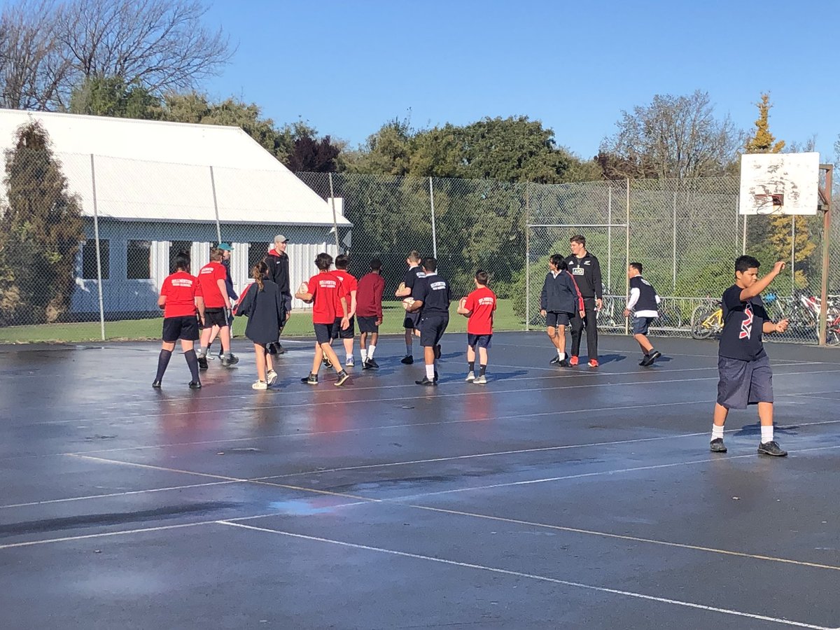 Megan_Woods's tweet photo. Glorious Christchurch sunshine the welcome the @AllBlacks to our city! Thanks so much to @ardiesavea, Scott Barret, Jack Goodhue &amp; @crfu for coming to Hillmorton High School to teach the students some slick moves https://t.co/hLsw5CU4Qr