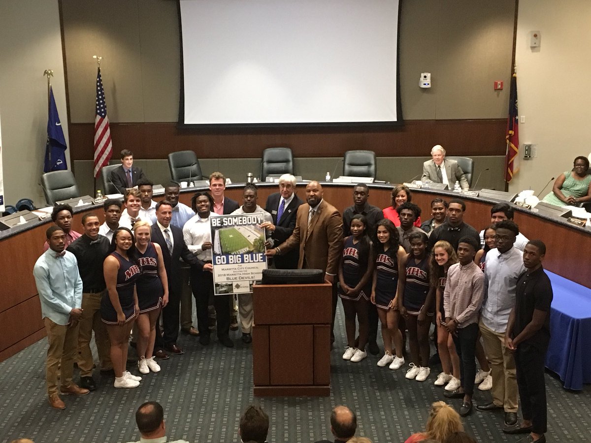 cityofmarietta's tweet photo. Mayor Steve "Thunder" Tumlin and City Council proudly welcomed the Marietta High School football seniors and the varsity cheerleading squad to their Wednesday, August 8th meeting and wished them all good luck during the upcoming football season and school year! GO BLUE DEVILS! https://t.co/TLyqwUXfss